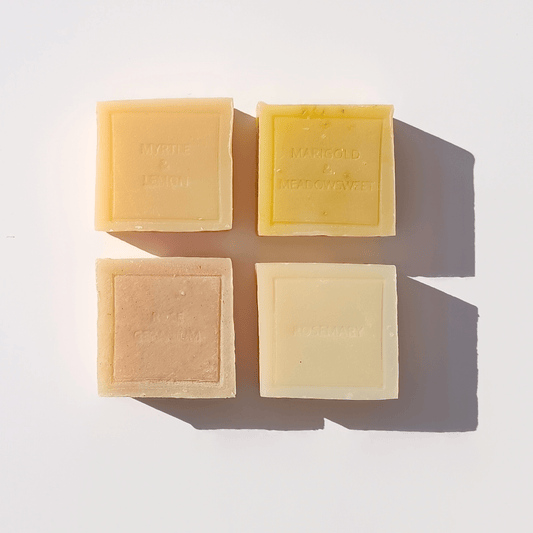 Mini handmade soap bar offered as a free gift with purchase