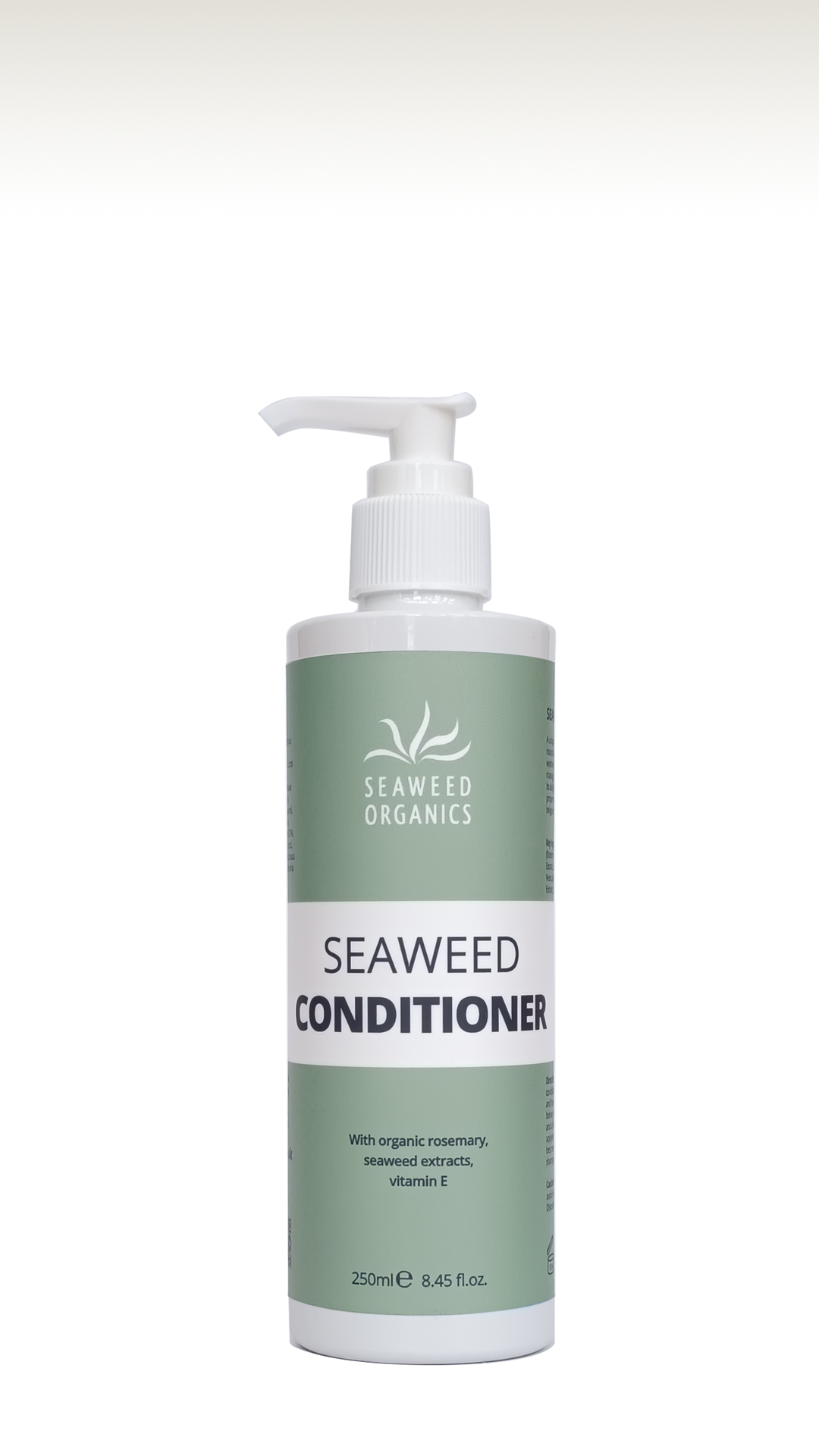 Eco-friendly vegan hair conditioner featuring seaweed and rosemary in pump dispenser