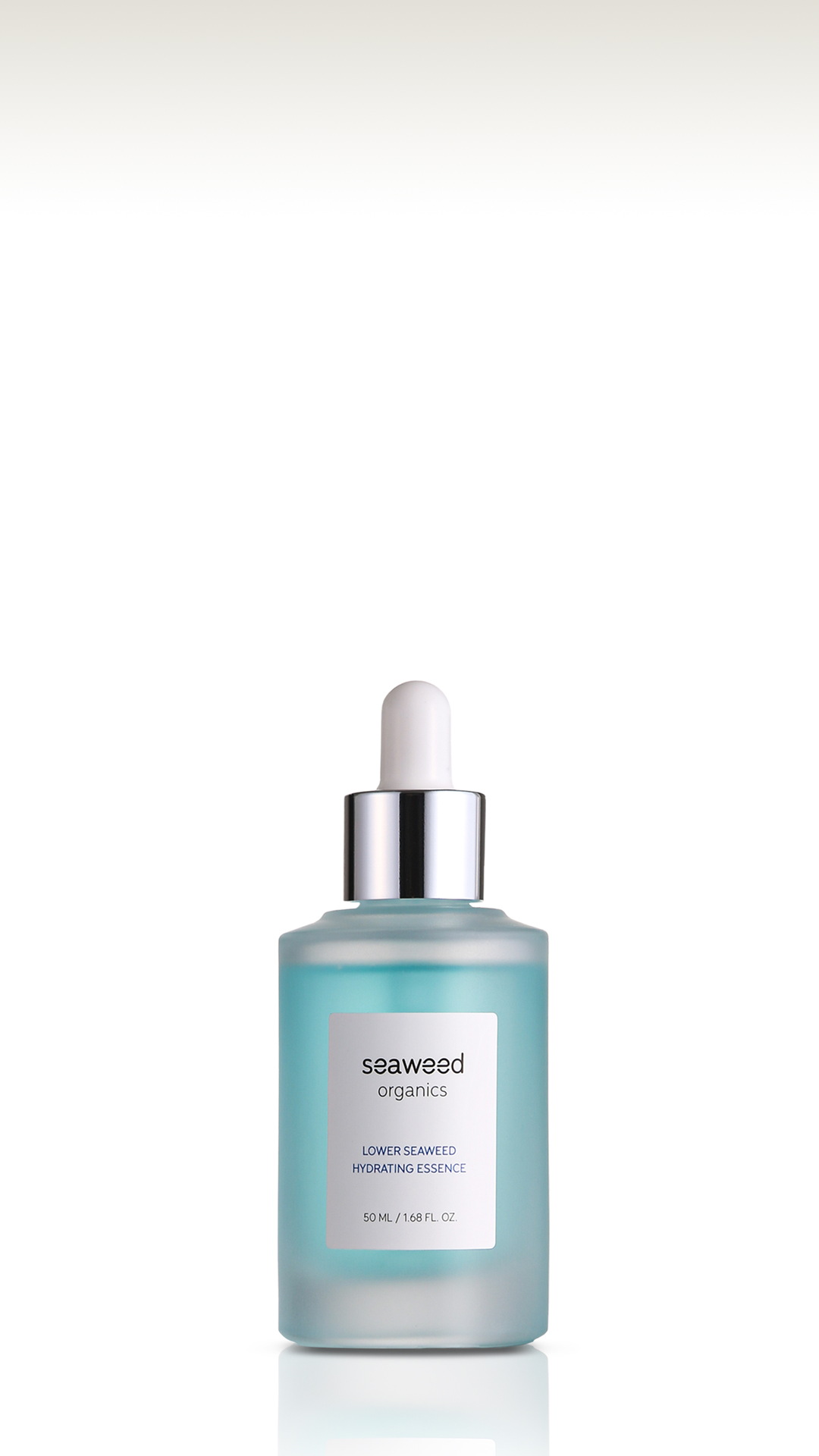 Clear SEAWEED ORGANICS essence bottle with silver pump and botanical backdrop