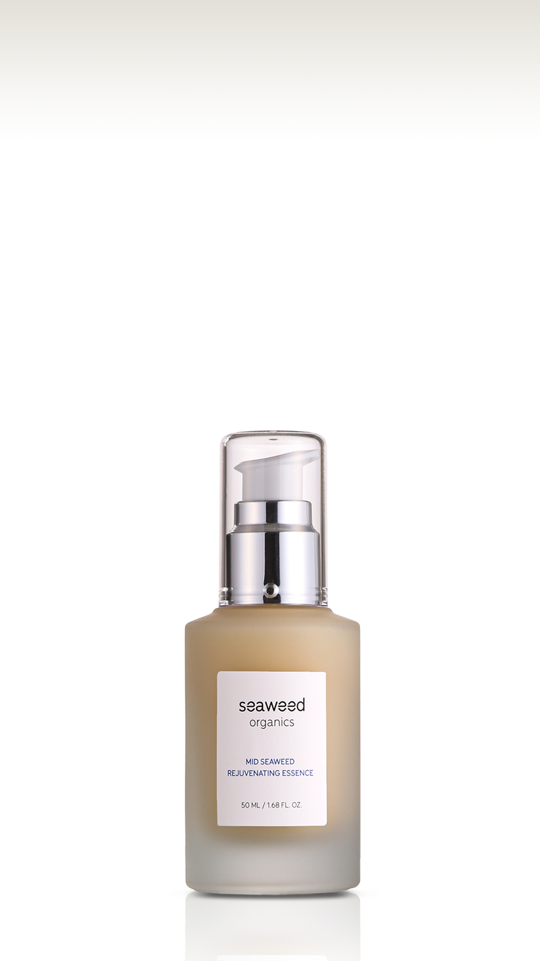 Elegant Mid essence bottle with pump, paired with fresh seaweed and sunlight reflections